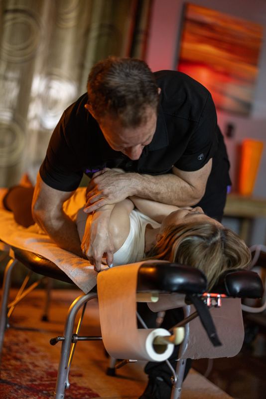 Dr. Bumgarner performing soft tissue mobilization on a patient's back