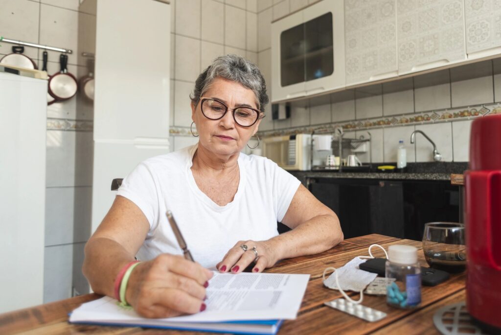 patient filling out forms at home