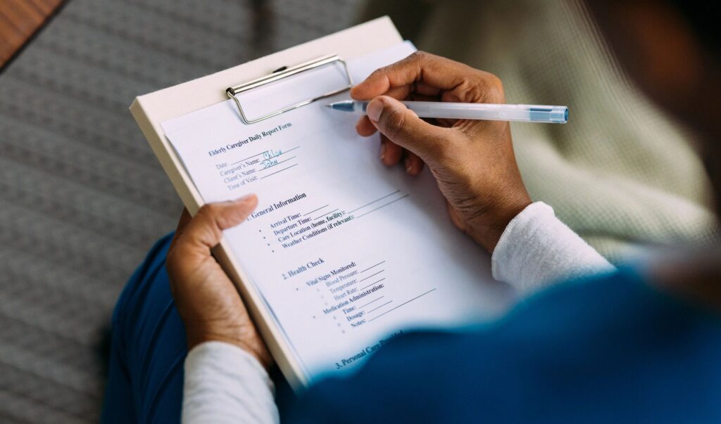 patient filling out forms at home